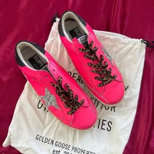 Golden Goose Women’s Neon Pink Superstar Sneakers with Silver Glitter Star